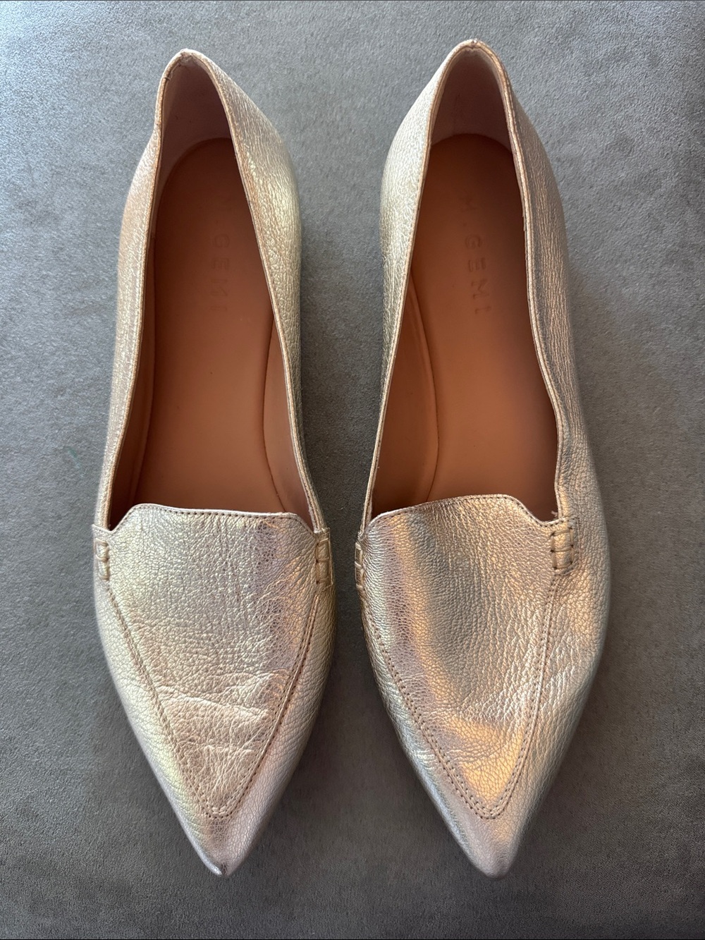 M. Gemi Metallic Pointed Loafers in Shimmering Champagne